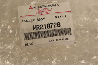 MR218728 PULLEY A,A/C COMPR TENSION