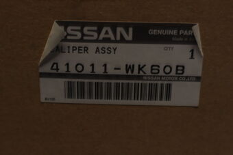 41011WK60B CALIPER ASSY-FRONT LH,W/O PADS OR SHIMS
