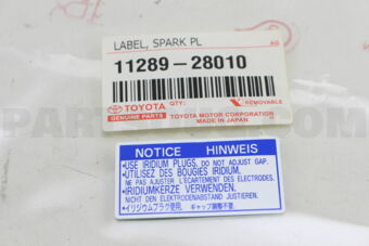 1128928010 PLATE, SPARK PLUG CAUTION