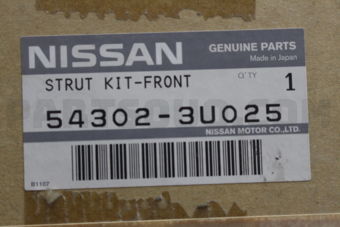 Nissan 543023U025 STRUT KIT-FRONT