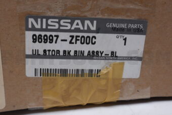 Nissan 96997ZF00C BACK PLATE-STORAGE DOOR