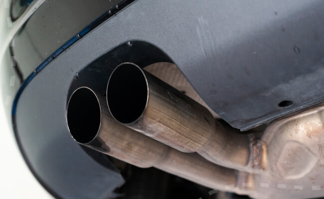 What is the threat of a hole in the muffler?
